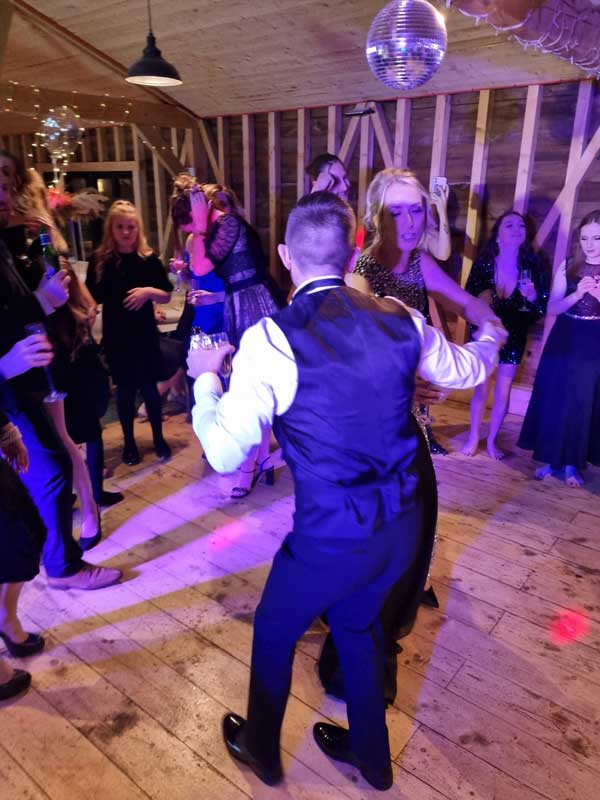 Birthday couple dancing at their 40th party in Birchington, Kent