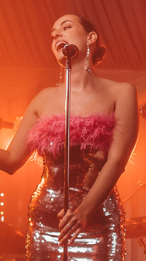 Georgie giving vocal performance